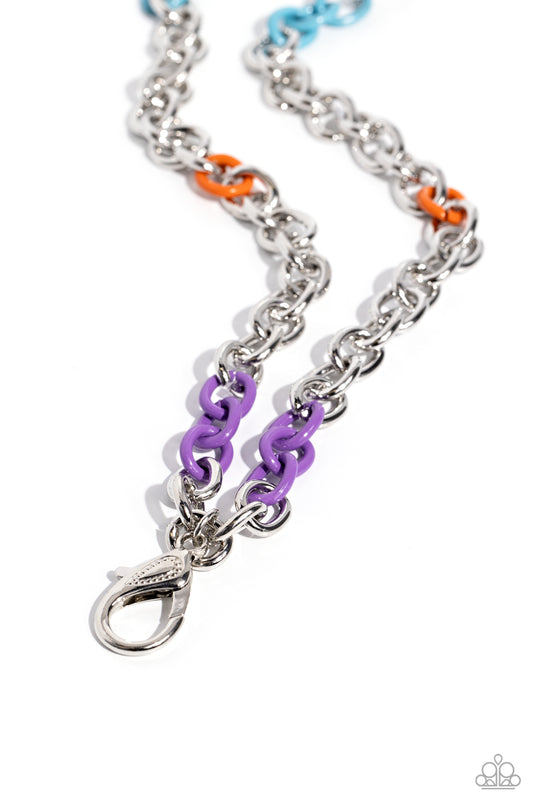 Paparazzi Accessories Colored Cabana - Multi A strand of thick oversized silver chain links, sporadically dotted with turquoise, orange, and purple links creates a bold, yet minimalistic elongated statement. A lobster clasp hangs from the bottom of the de