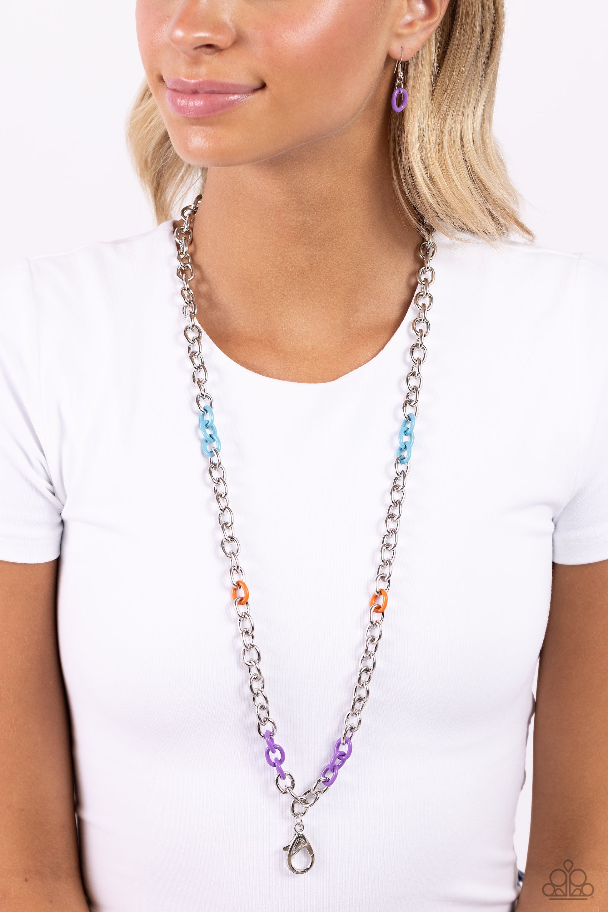 Paparazzi Accessories Colored Cabana - Multi A strand of thick oversized silver chain links, sporadically dotted with turquoise, orange, and purple links creates a bold, yet minimalistic elongated statement. A lobster clasp hangs from the bottom of the de