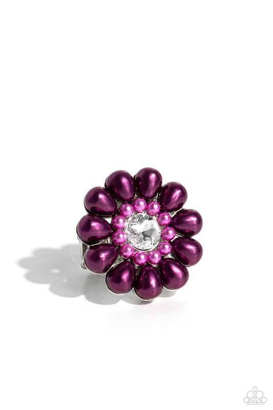 Paparazzi Accessories PEARL Talk - Purple Featuring a glassy white gem center, bubbly oversized plum pearl petals fan out from dainty orchid pearl settings atop the finger on airy silver bands for a sophisticated floral fashion. Features a stretchy band f