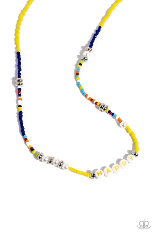 Paparazzi Accessories Happy to See You - Yellow Infused along an invisible string, white pearls, multicolored seed beads, silver accents, and white beads spelling out the word "HAPPY" in yellow lettering wrap around the neckline for an optimistic, youthfu