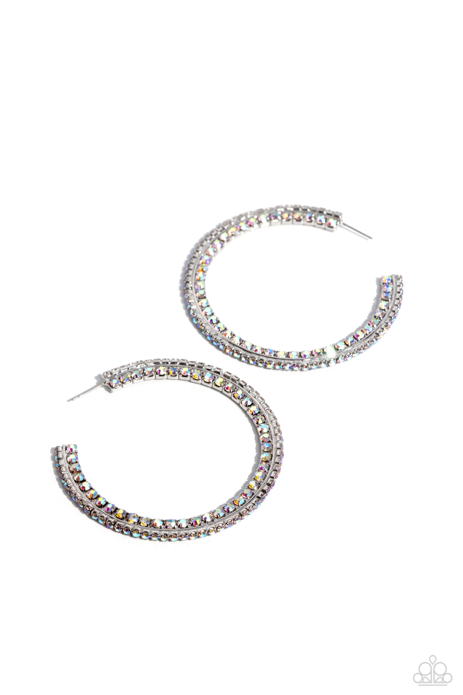 Paparazzi Accessories Scintillating Sass - Multi Glittery iridescent rhinestones are encrusted along the front and side of a textured tread-like oversized silver hoop for a sassy finish. Earring attaches to a standard post fitting. Hoop measures 2 1/2" in