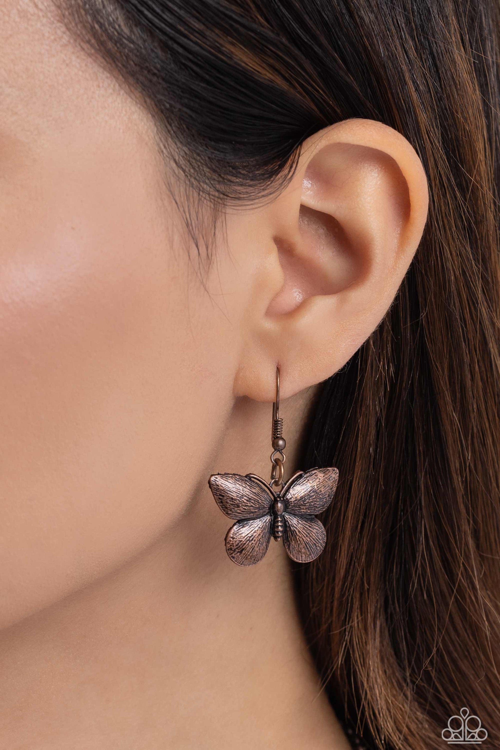Paparazzi Accessories DRAWN to the Wind - Copper Brushed in a linear texture, an exaggeratedly large copper moth plate flutters along a copper chain below the collar for an enchanting fashion. Features an adjustable clasp closure. Sold as one individual n