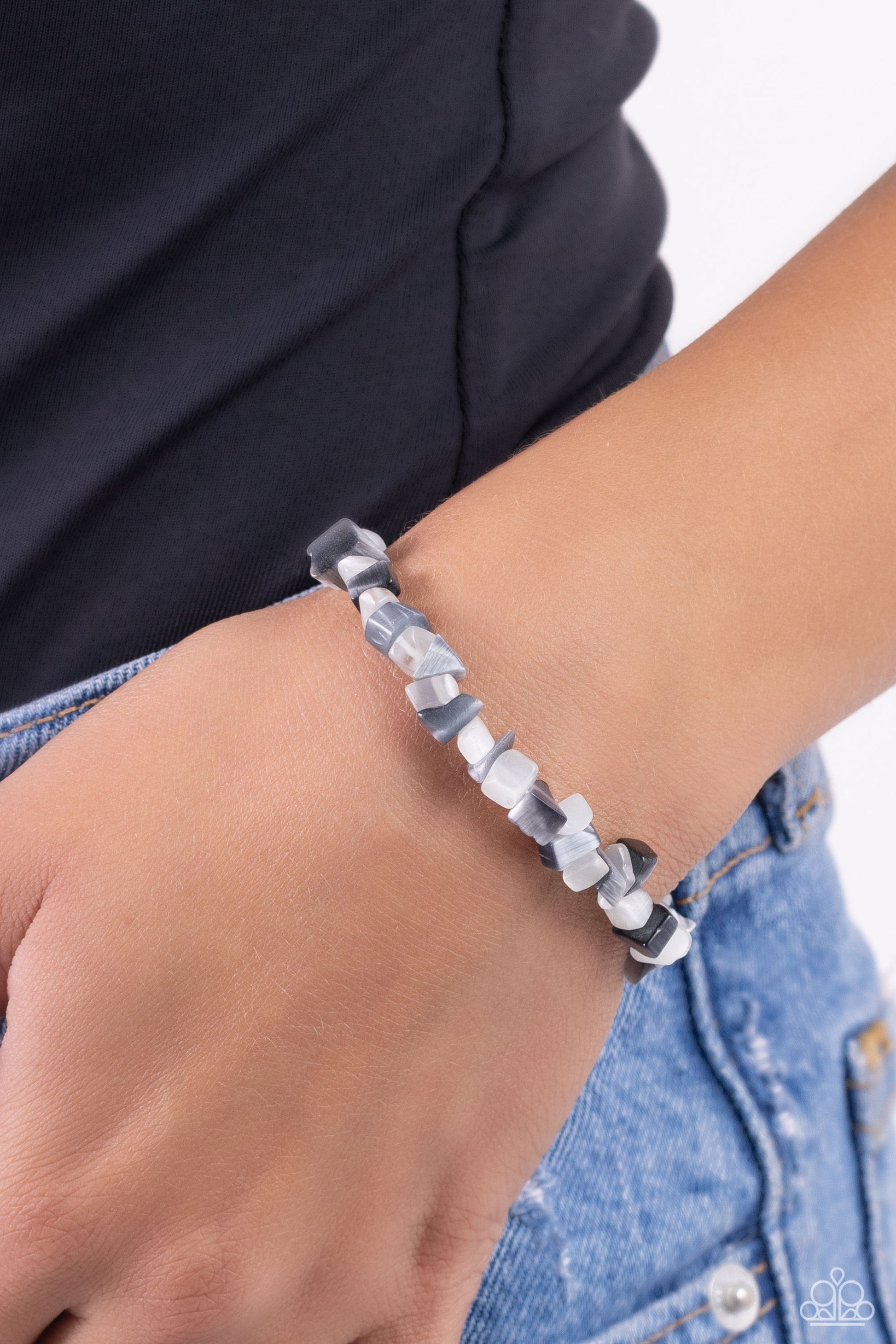 Paparazzi Accessories Chiseled Cameo - Silver An earthy collection of gray and white chiseled pebbles are threaded along a stretchy band around the wrist in a free-spirited pattern. Sold as one individual bracelet. Jewelry