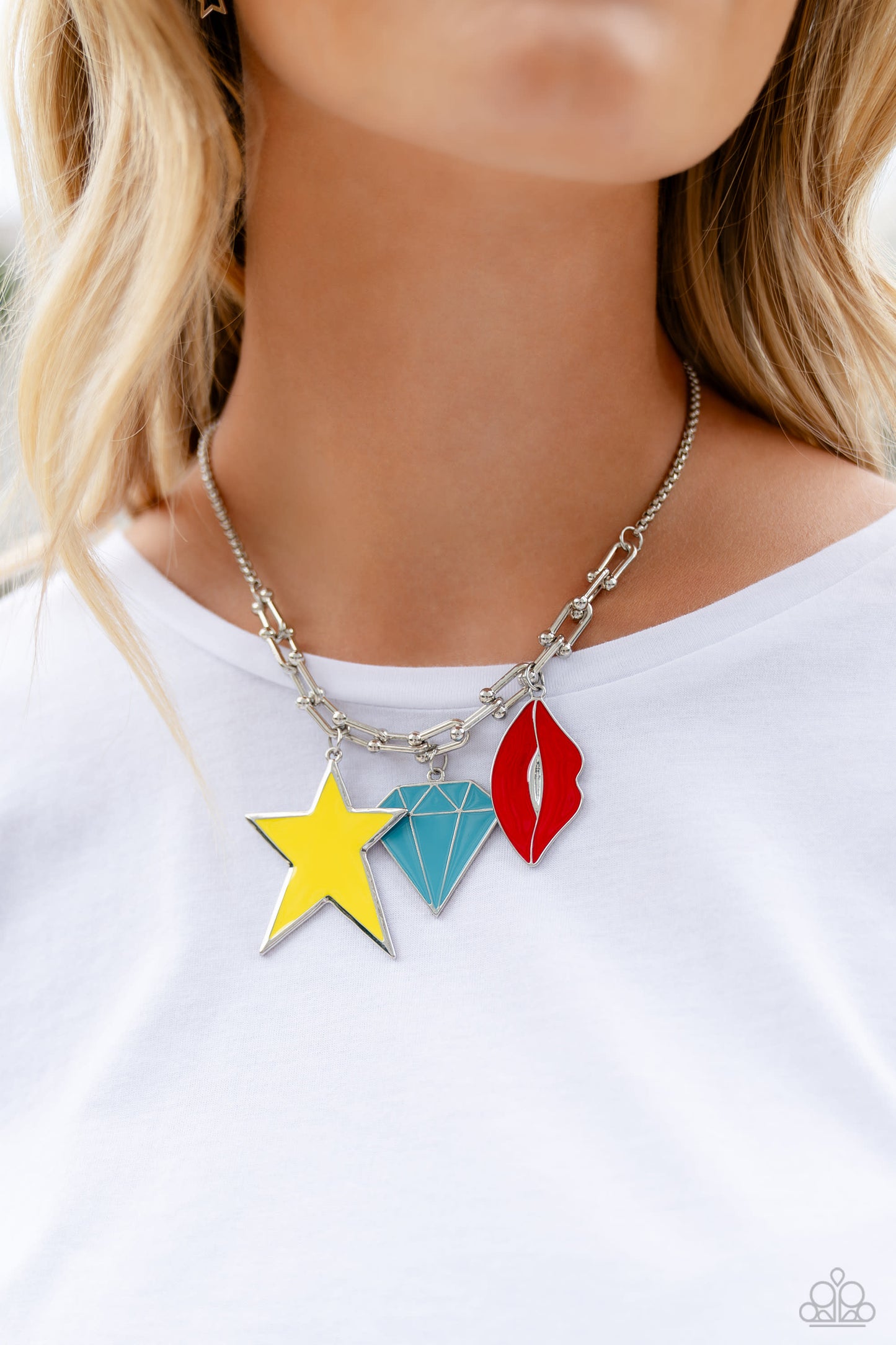 Paparazzi Accessories Scouting Shapes - Multi A strand of gleaming silver popcorn chain leads the eye down to a collection of silver horseshoe-like strands that coalesce below the collar. Attached to the horseshoe fittings, an oversized yellow star, turqu