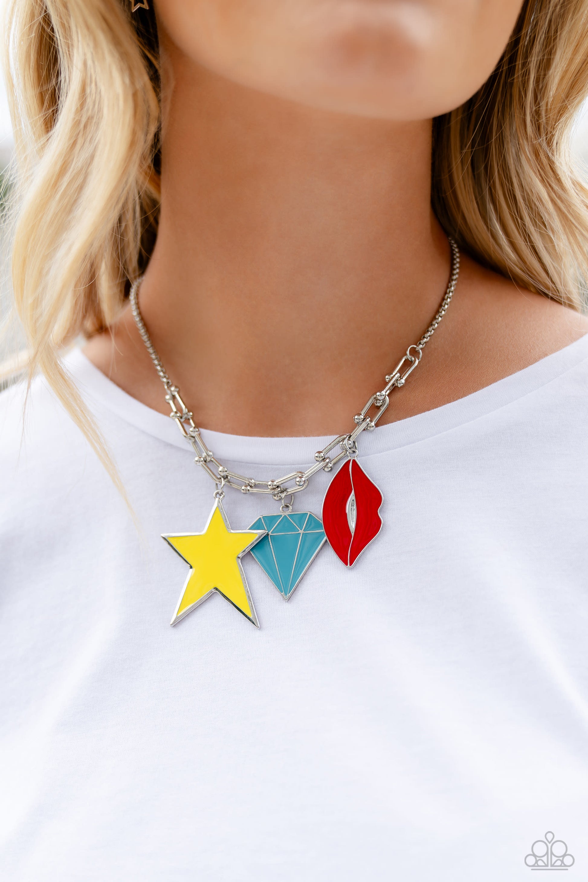 Paparazzi Accessories Scouting Shapes - Multi A strand of gleaming silver popcorn chain leads the eye down to a collection of silver horseshoe-like strands that coalesce below the collar. Attached to the horseshoe fittings, an oversized yellow star, turqu