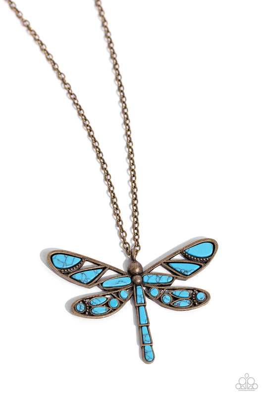 Paparazzi Accessories FLYING Low - Brass Featuring a classic brass chain, various cuts of turquoise stone are passed into an oversized, airy brass dragonfly pendant for a rustically earthy centerpiece. Features an adjustable clasp closure. As the stone el