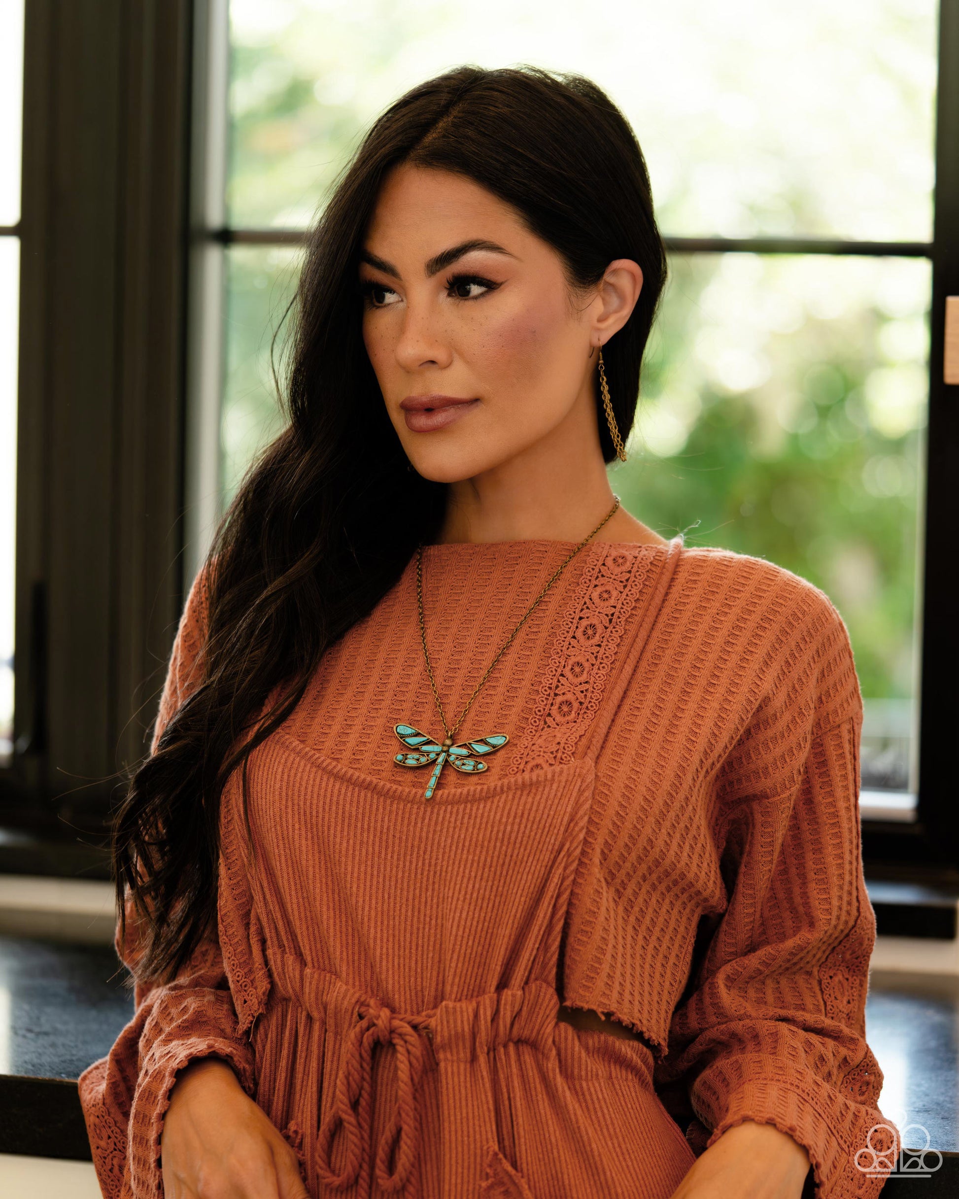 Paparazzi Accessories FLYING Low - Brass Featuring a classic brass chain, various cuts of turquoise stone are passed into an oversized, airy brass dragonfly pendant for a rustically earthy centerpiece. Features an adjustable clasp closure. As the stone el