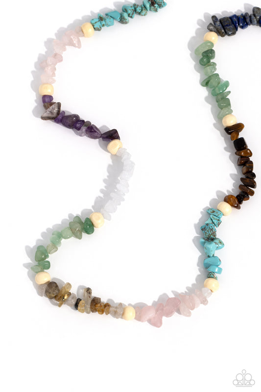 Paparazzi Accessories Soothing Stones - Multi Infused on an invisible wire, chiseled turquoise, jade, rose quartz, lapis, amethyst, clear white, gray, and tiger's eye stones coalesce around the collar for a colorfully, earthy statement. White wood beads s