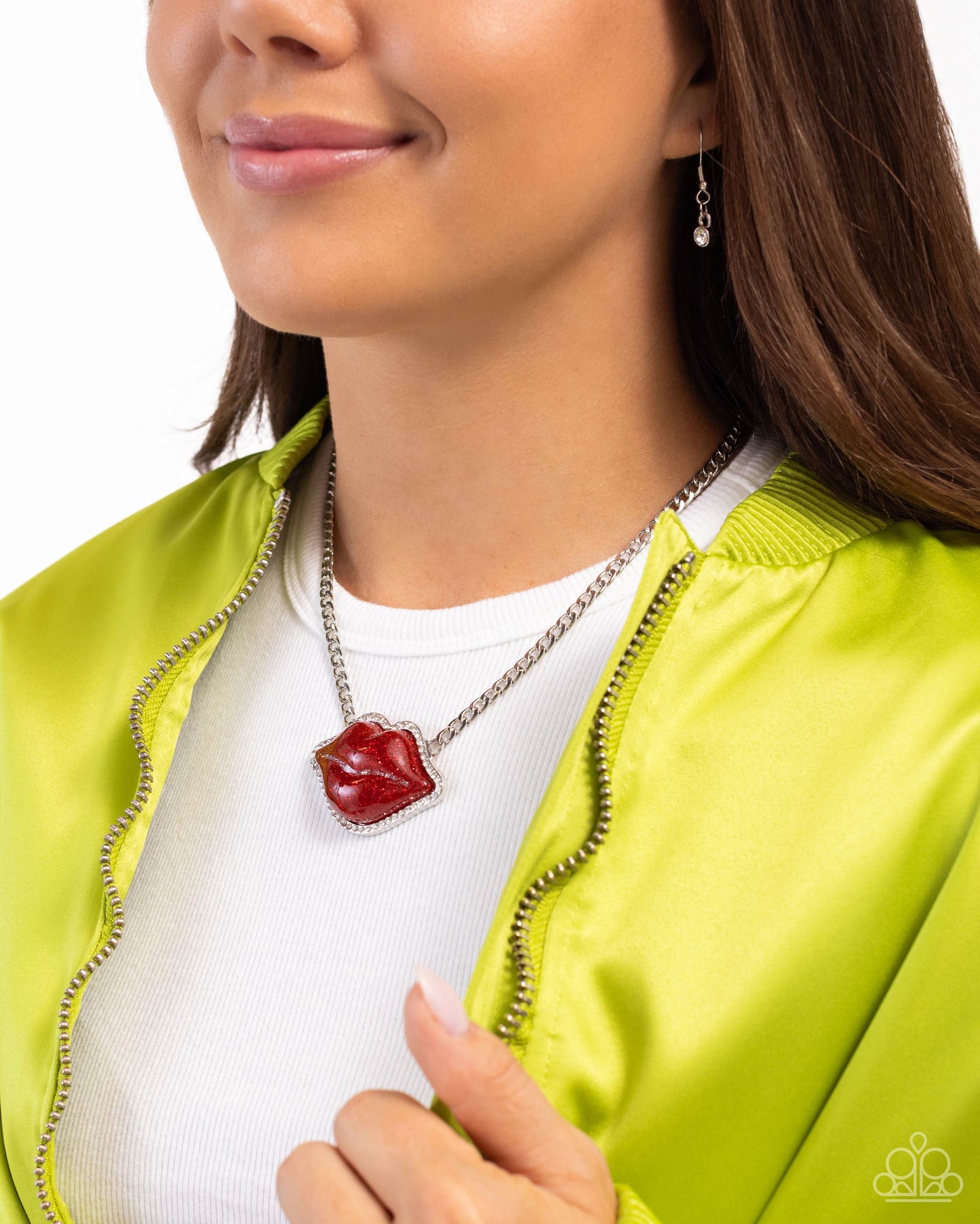 Paparazzi Accessories Lip Locked - Red Featuring a glittery finish, an oversized red lip pendant swings from the bottom of a silver link chain below the collar for a romantic statement. White rhinestones border the charm for additional stunning detail. Fe
