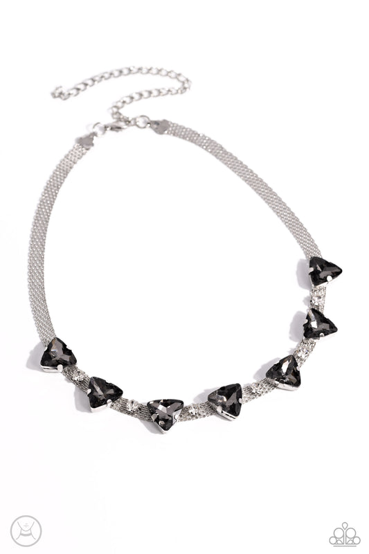 Paparazzi Accessories Strands of Sass - Silver Suspended from two silver fittings, a shimmery cascade of dainty silver chains layer around the collar for an industrial statement. Infused amongst the industrial strands, a collection of pronged white gems a