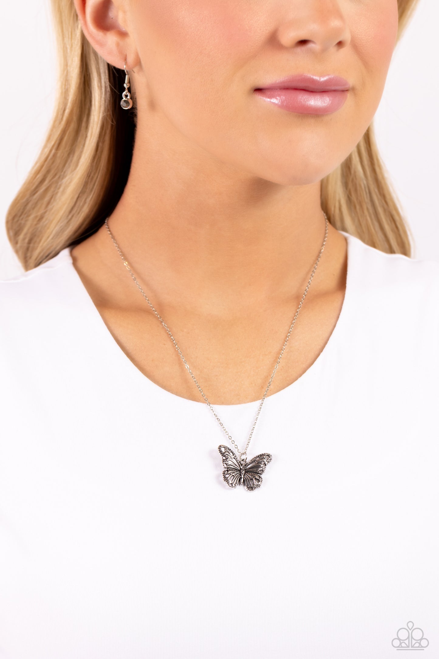 Paparazzi Accessories Textured Talent - Silver Filled with filigree, studded details, and dainty hematite accents, a rustic silver butterfly flutters from the bottom of a dainty silver chain for a whimsical fashion. Features an adjustable clasp closure. S