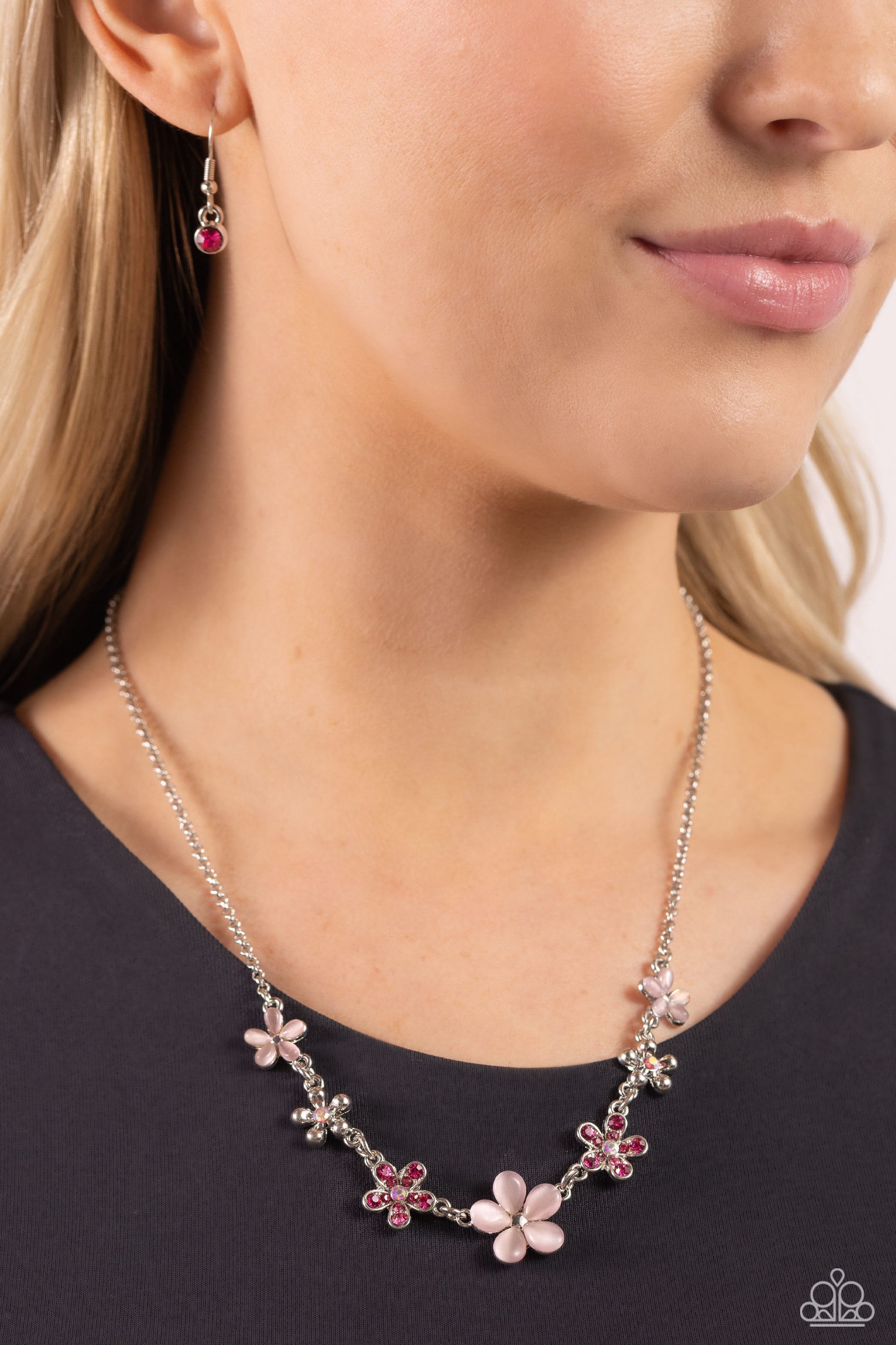 Paparazzi Accessories Spring Showcase - Pink Pink cat's eye stone petals bloom from silver stud centers, linking into various sizes of ethereal blossoms below the collar on a dainty silver chain. Silver-studded petals bloom from pink iridescent rhinestone