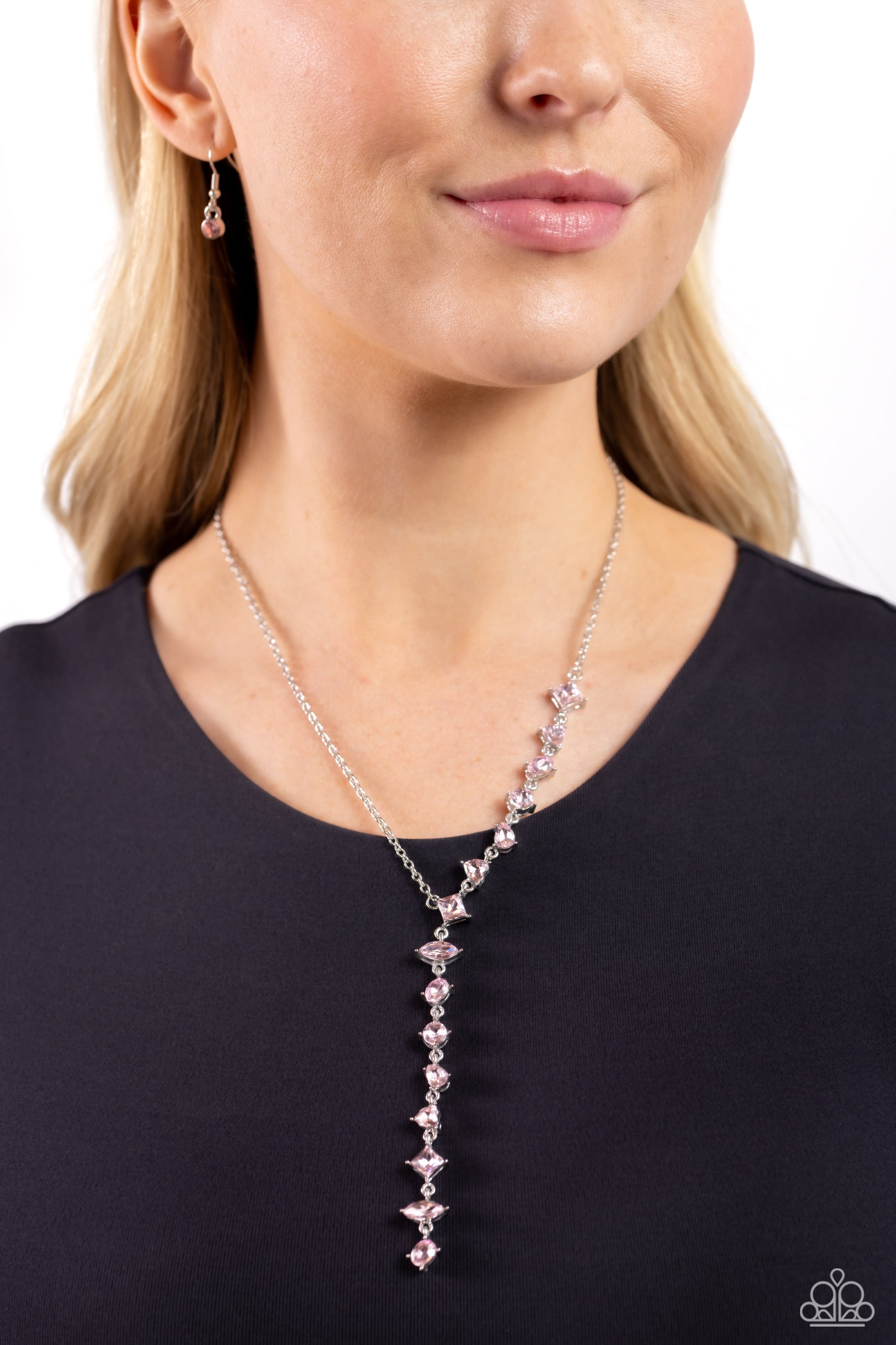 Paparazzi Accessories Diagonal Daydream - Pink Featuring pronged fittings, a collection of baby pink square-cut, heart, oval, round, and teardrop gems cascade down the neckline in a diagonal pattern, creating an intense, incandescent statement piece. Feat