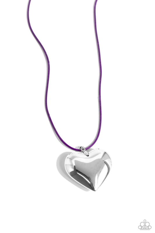 Paparazzi Accessories Devoted Daze - Purple An oversized, sleek silver heart glides along a vibrant purple cord, creating a flirtatious pendant below the collar. Features an adjustable clasp closure. Sold as one individual necklace. Includes one pair of m