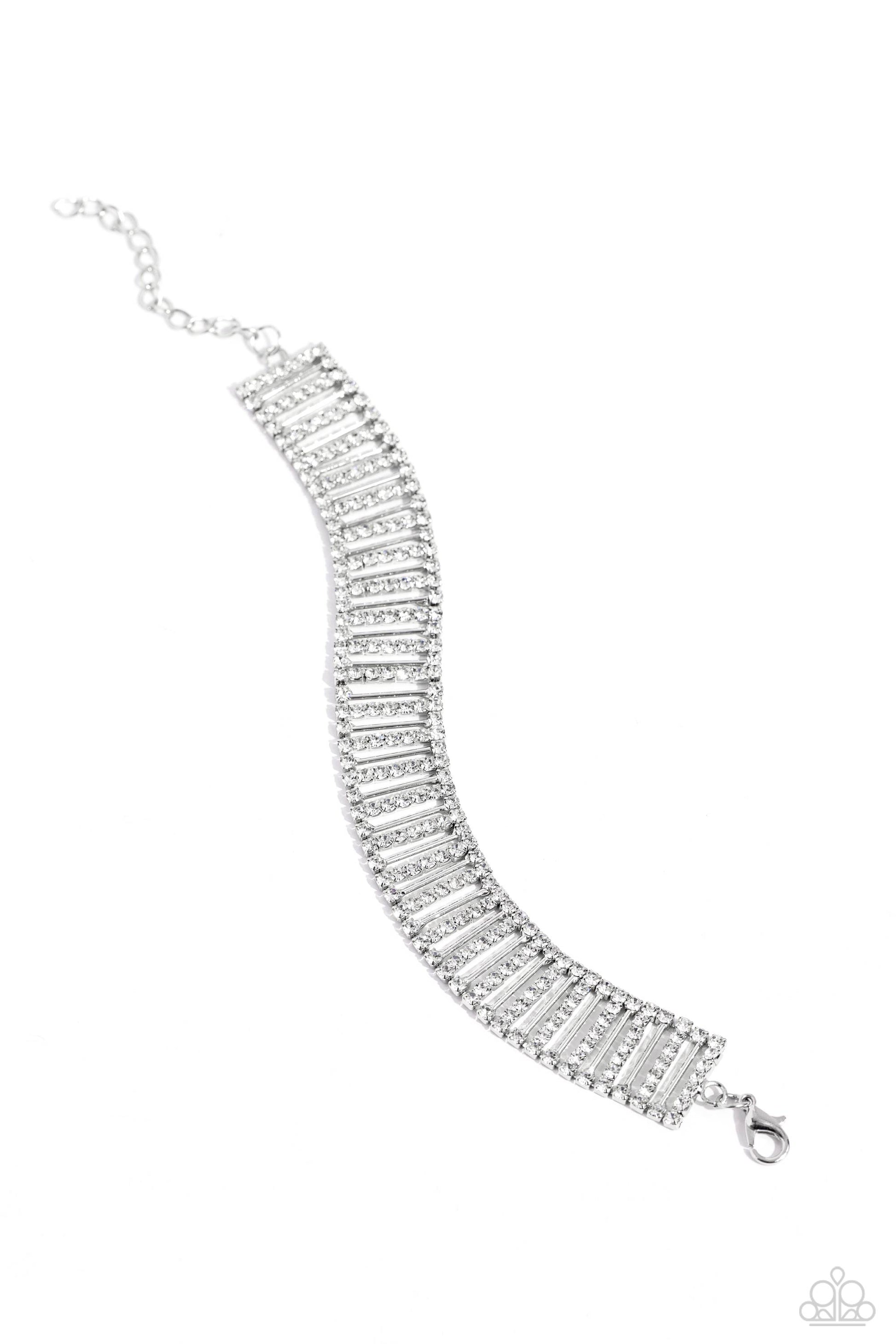 Paparazzi Accessories Elusive Elegance - White Separated by white rhinestones, rhinestone-covered silver bars and thin sleek silver bars alternate around the wrist for a glitzy display. Features an adjustable clasp closure. Sold as one individual bracelet