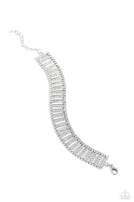 Paparazzi Accessories Elusive Elegance - White Separated by white rhinestones, rhinestone-covered silver bars and thin sleek silver bars alternate around the wrist for a glitzy display. Features an adjustable clasp closure. Sold as one individual bracelet