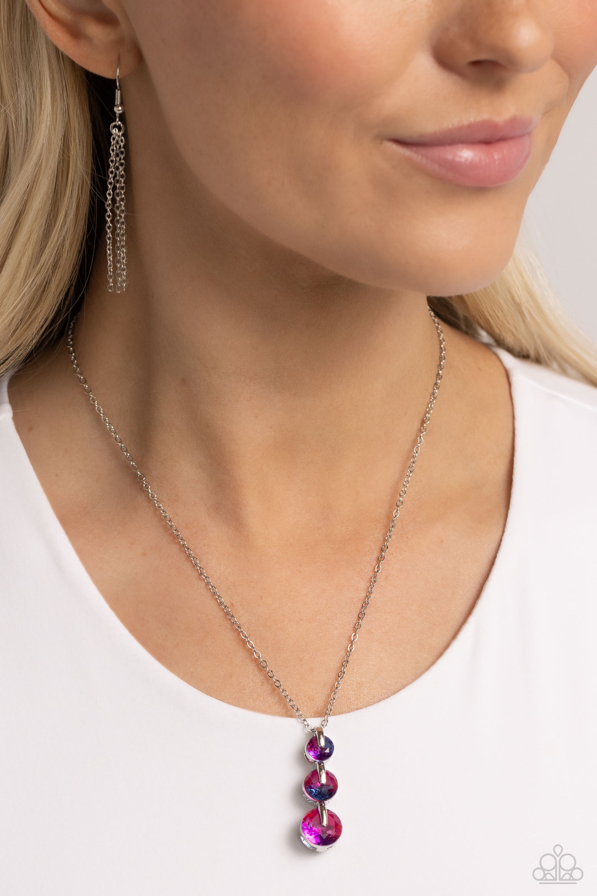 Paparazzi Accessories Ombré Obsession - Multi Featuring a UV finish, a collection of blue, purple, and pink gems are set in elevated, pronged silver fittings as they gradually increase in size along a dainty silver chain to create a prismatic, ombré displ
