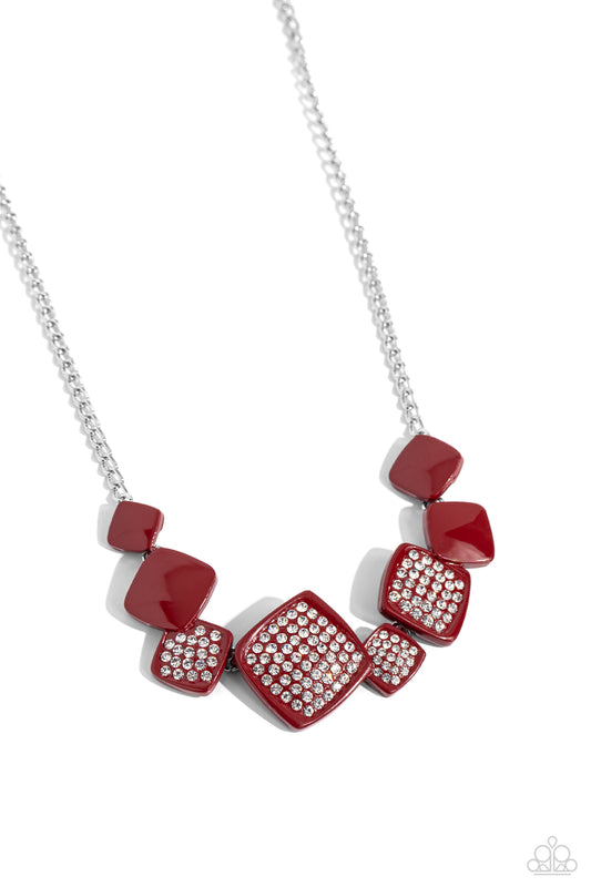 Paparazzi Accessories Twinkling Tables - Red Infused along a classic silver chain, tilted, glossy, wine-painted squares lead the eye to rhinestone-embossed wine-painted squares that alternate in size, creating a standout statement below the collar. Featur