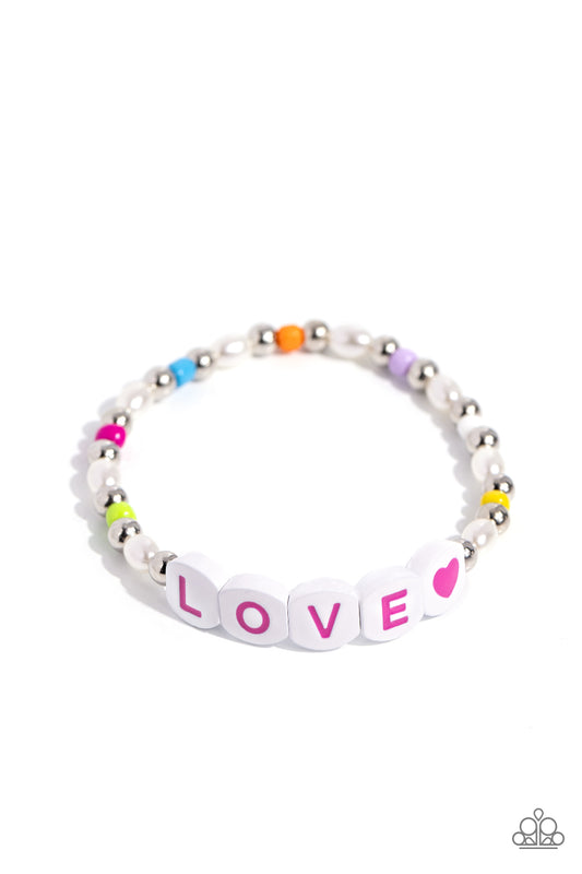 Paparazzi Accessories Love Language - Multi Infused on an elastic stretchy band, white pearls, multicolored seed beads, silver studs, and white beads with hot pink letters spelling out the word "LOVE" with a hot pink heart bead as it wraps around the wris
