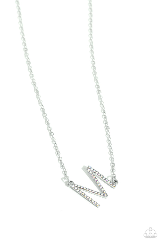 Paparazzi Accessories INITIALLY Yours - M - Multi Embossed with dainty iridescent rhinestones, a silver letter "M" hovers below the collar from a dainty silver chain, for a sentimentally simple design. Features an adjustable clasp closure. Due to its pris