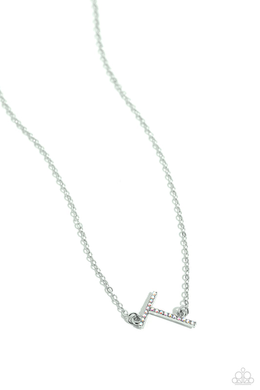 Paparazzi Accessories INITIALLY Yours - T - Multi Embossed with dainty iridescent rhinestones, a silver letter "T" hovers below the collar from a dainty silver chain, for a sentimentally simple design. Features an adjustable clasp closure. Due to its pris
