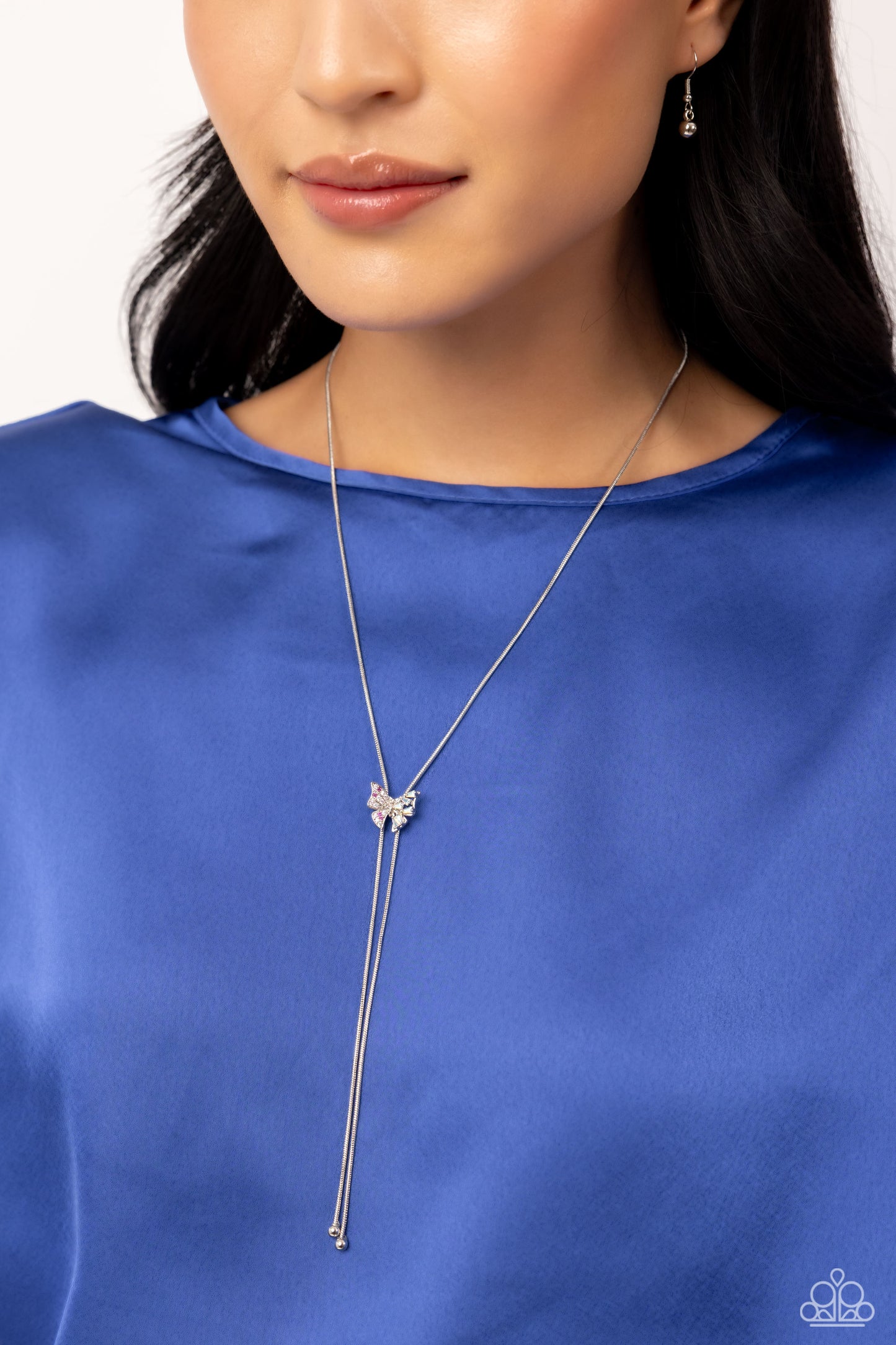 Paparazzi Accessories Adjustable Alliance - Pink Dotted with various dainty pink rhinestones on one wing and chiseled iridescent pieces on the other, a dainty silver butterfly flutters along a strand of silver snake chain, creating a wildly whimsical adju