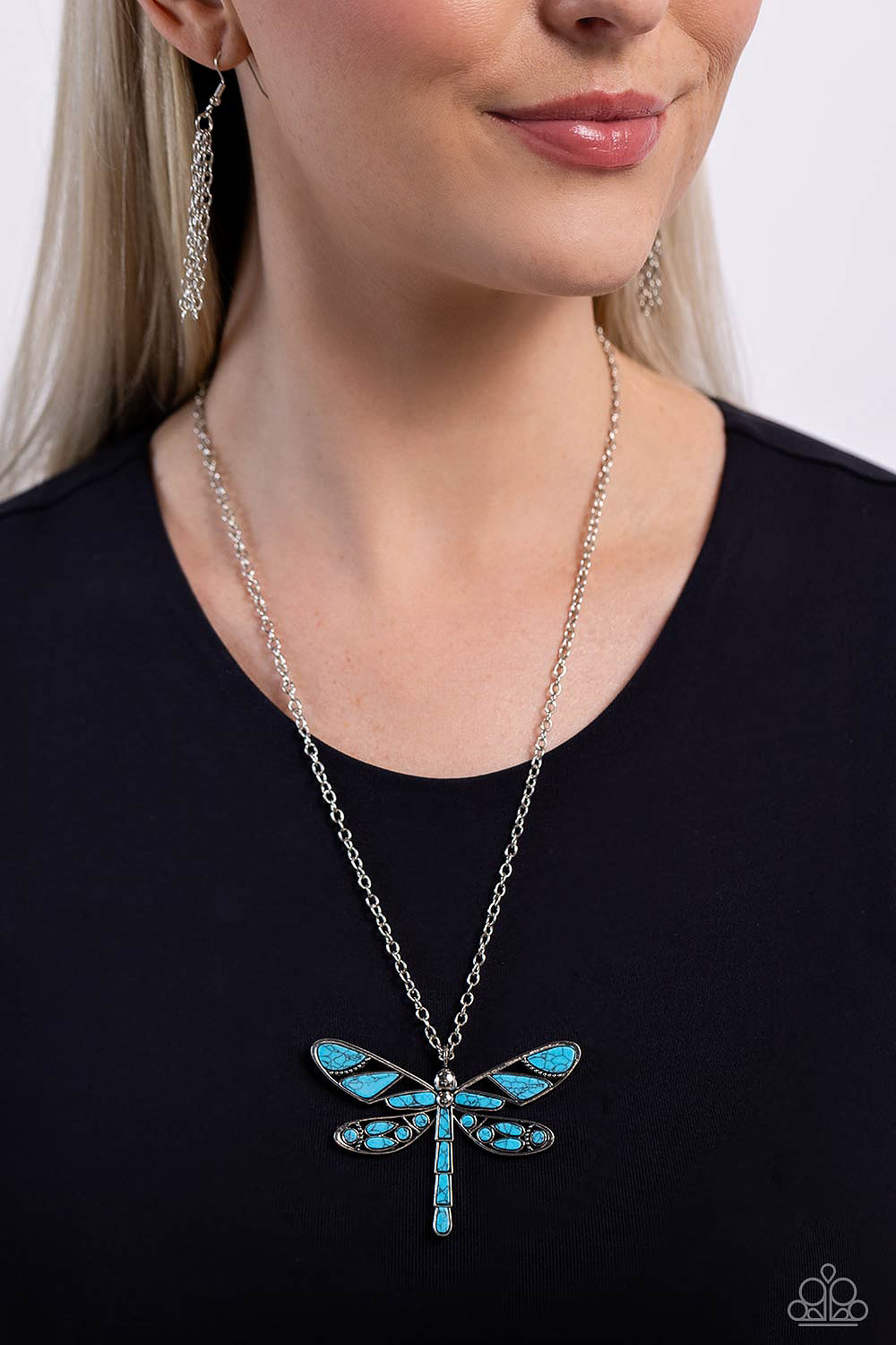 Paparazzi Accessories FLYING Low - Blue Featuring a classic silver chain, various cuts of turquoise stone are passed into an oversized, airy silver dragonfly pendant for a rustically earthy centerpiece. Features an adjustable clasp closure. As the stone e