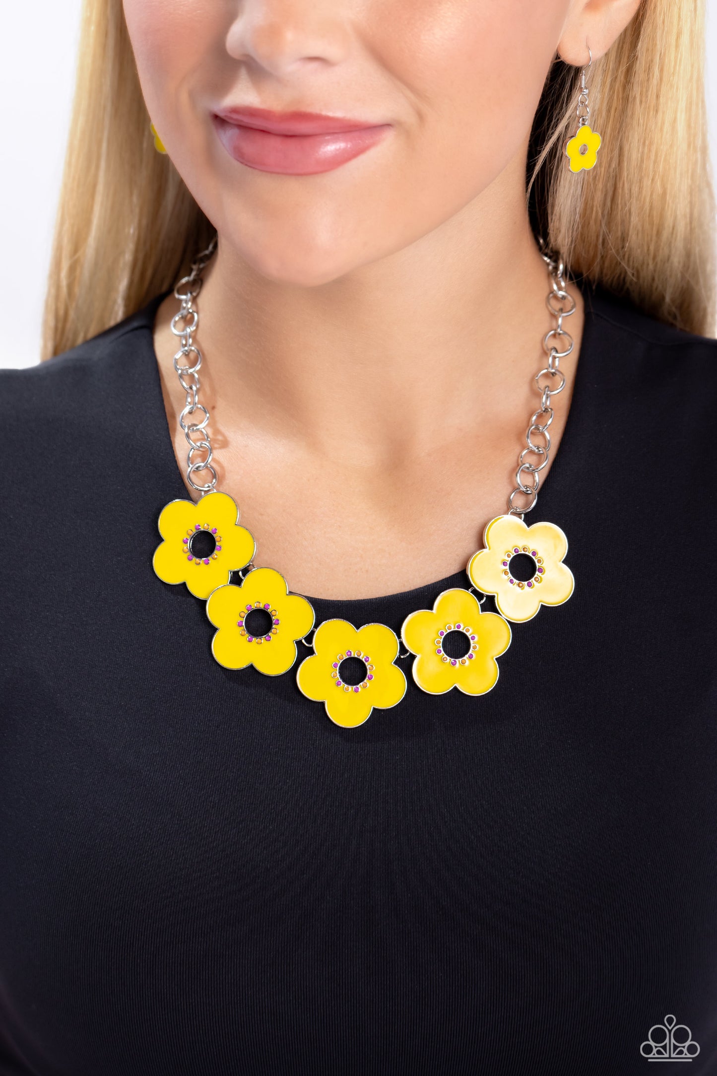 Paparazzi Accessories Cartoon Couture - Yellow Cascading from a collection of glistening silver links, High Visibility-painted airy flowers bloom across the collar. Embellished around each center, Rose Violet and orange beads are dotted in an alternate pa