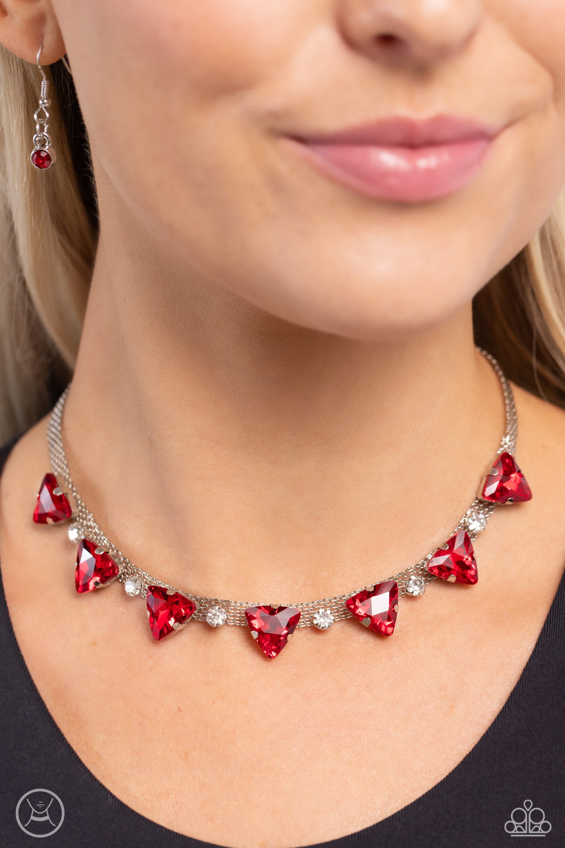 Paparazzi Accessories Strands of Sass - Red Suspended from two silver fittings, a shimmery cascade of dainty silver chains layer around the collar for an industrial statement. Infused amongst the industrial strands, a collection of pronged white gems alte