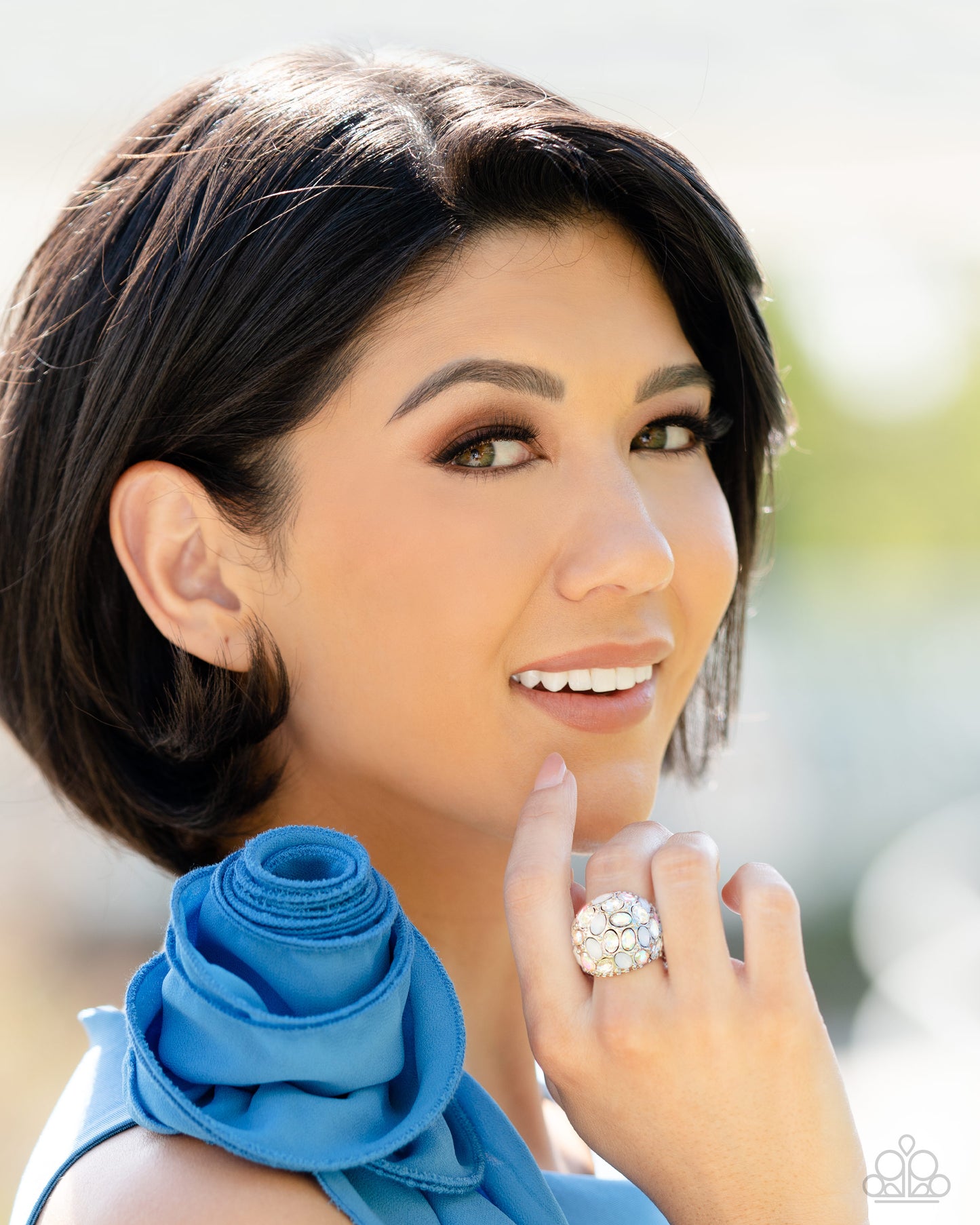 Paparazzi Accessories BLING Loud and Proud - White A studded silver frame, filled with blinding oval-cut gems in opalescent, white, and iridescent shades, stands out atop the finger for a blingy statement. Features a stretchy band for a flexible fit. Due
