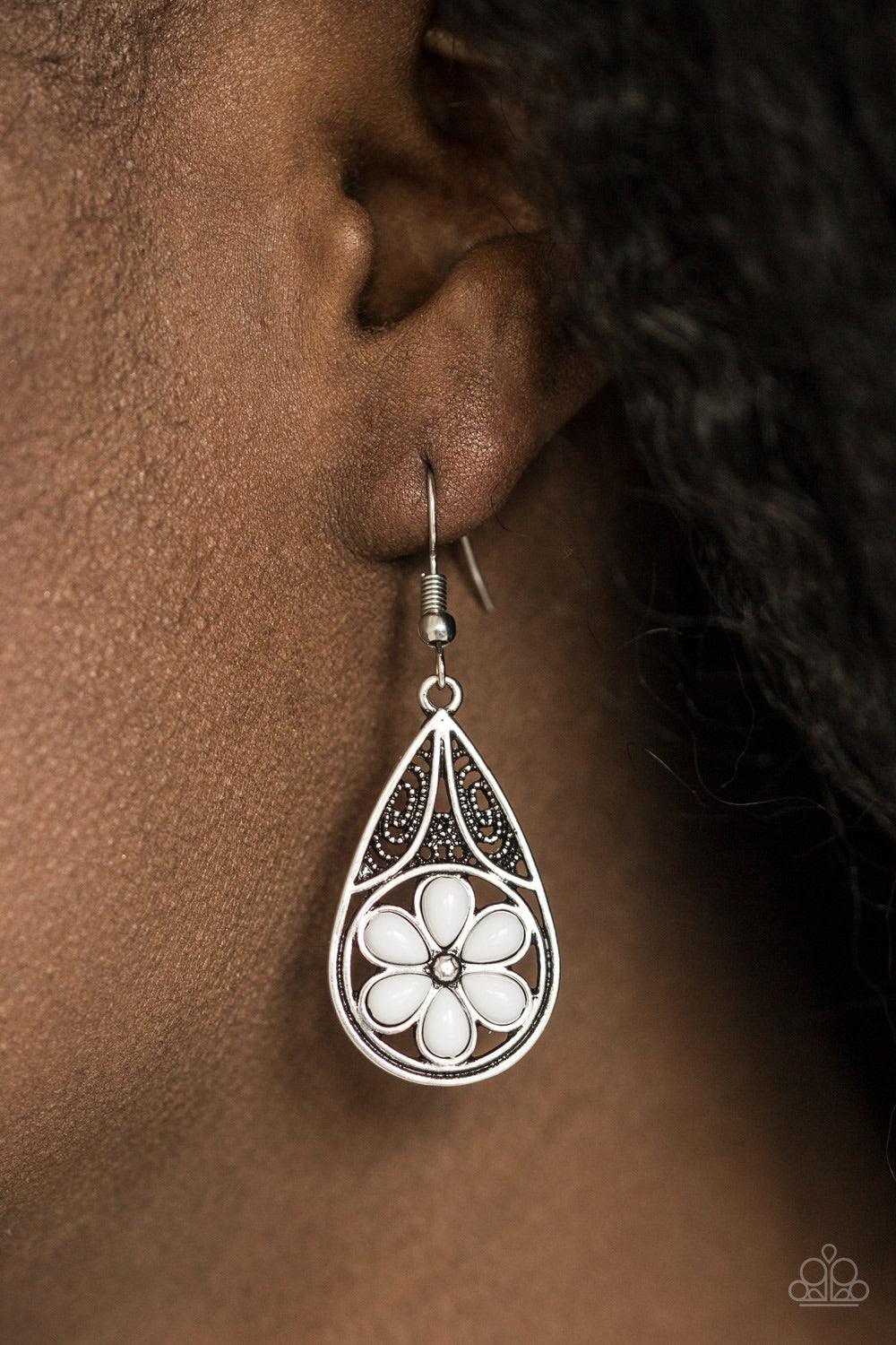 Paparazzi Accessories Countryside Cottage - White Refreshing white beads are pressed into the bottom of an ornate silver teardrop, creating a whimsical floral pattern. Earring attaches to a standard fishhook fitting. Jewelry