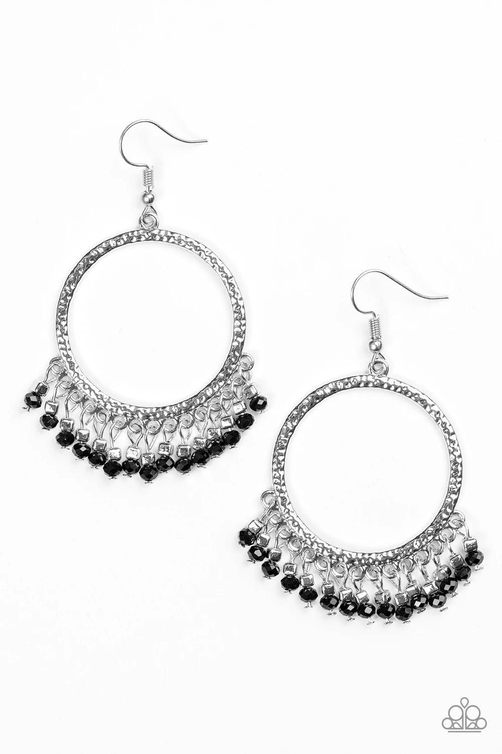 Paparazzi Accessories Tambourine Tango - Black Faceted black beads and silver cube beads swing from the bottom of a hammered silver hoop, creating a flirty fringe. Earring attaches to a standard fishhook fitting. Sold as one pair of earrings. Paparazzi Je