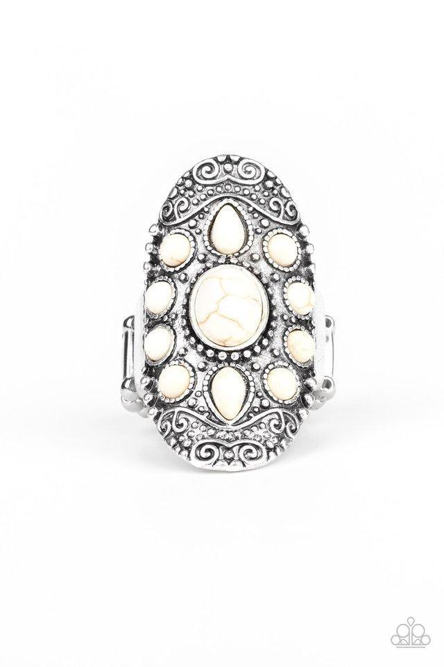 Paparazzi Accessories Stone Sunrise - White Embossed in a studded filigree pattern, an oval silver frame folds around the finger. Featuring round, oval, and teardrop shapes, refreshing white stone beads are pressed into the center of the frame, creating a