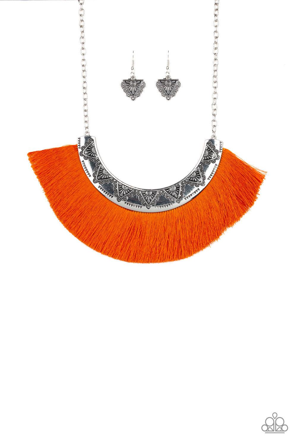 Paparazzi Accessories Might And Mane - Orange A plume of shiny orange thread flares out from the bottom of a silver half-moon frame stamped in tribal inspired patterns, creating a fierce fringe below the collar. Features an adjustable clasp closure. Jewel