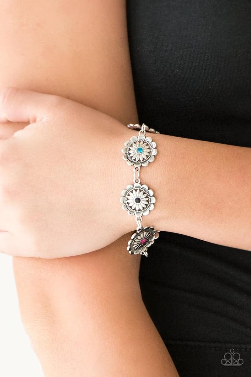 Paparazzi Accessories Funky Flower Child - Multi Dotted with multicolored rhinestone centers, ornate silver floral frames link across the wrist for a seasonal look. Features an adjustable clasp closure. Sold as one individual bracelet. Jewelry