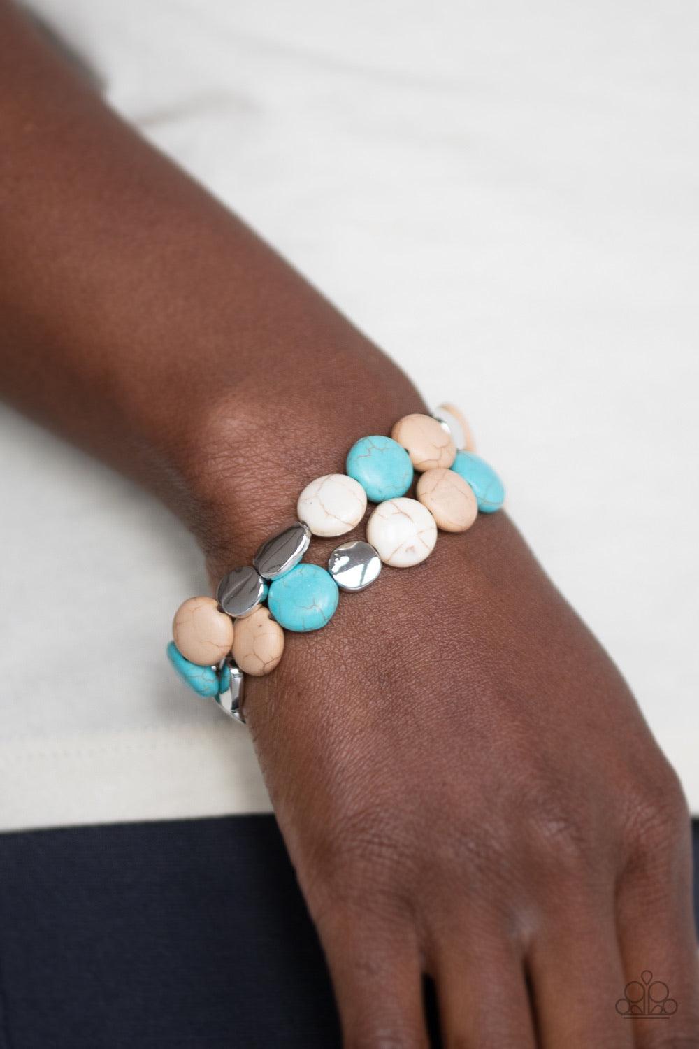 Paparazzi Accessories Simply Sedimentary - Multi A collection of round red, blue, and brown stones and flat silver beads are threaded along stretchy bands around the wrist, creating earthy layers. Jewelry
