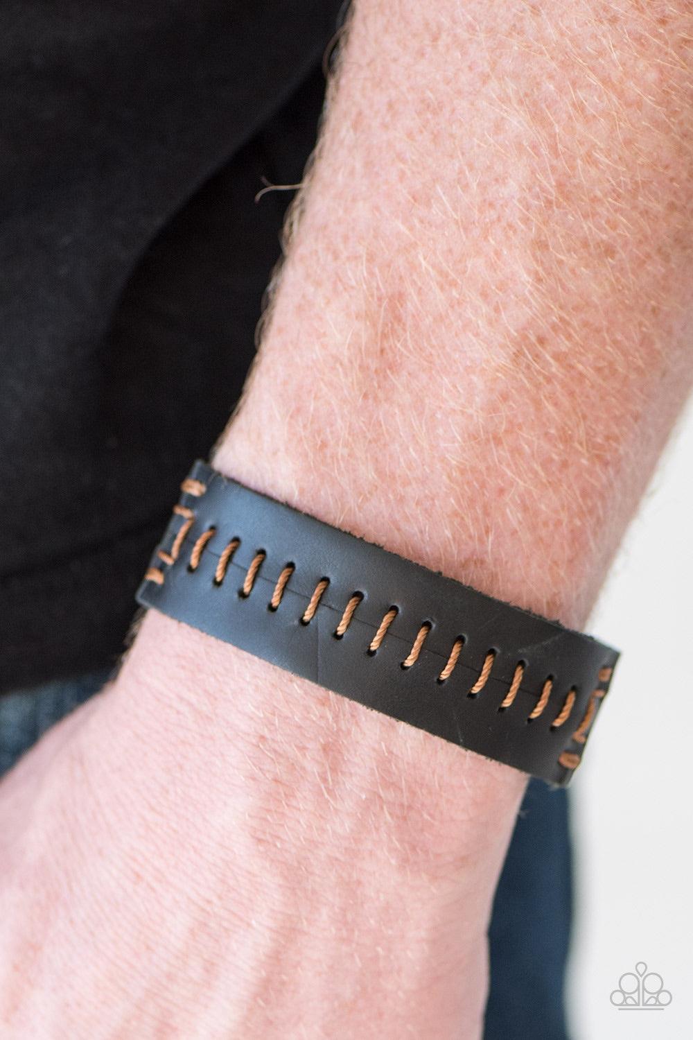 Paparazzi Accessories Take One For The Team - Brown Brown thread is stitched across the front of a leather band for an urban look. Features an adjustable snap closure. Jewelry