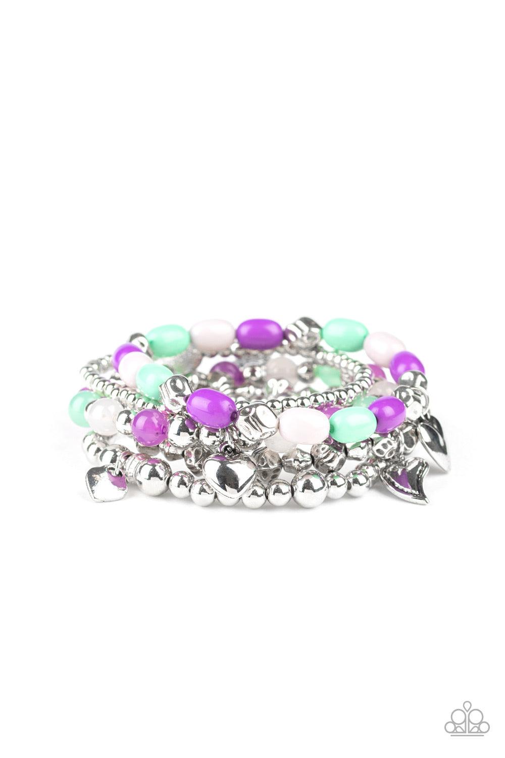 Paparazzi Accessories No CHARM Done - Multi A mismatched collection of silver charms, cloudy and polished multicolored beads, and shimmery silver beads are threaded along stretchy bands around the wrist for a charmingly layered look. Jewelry