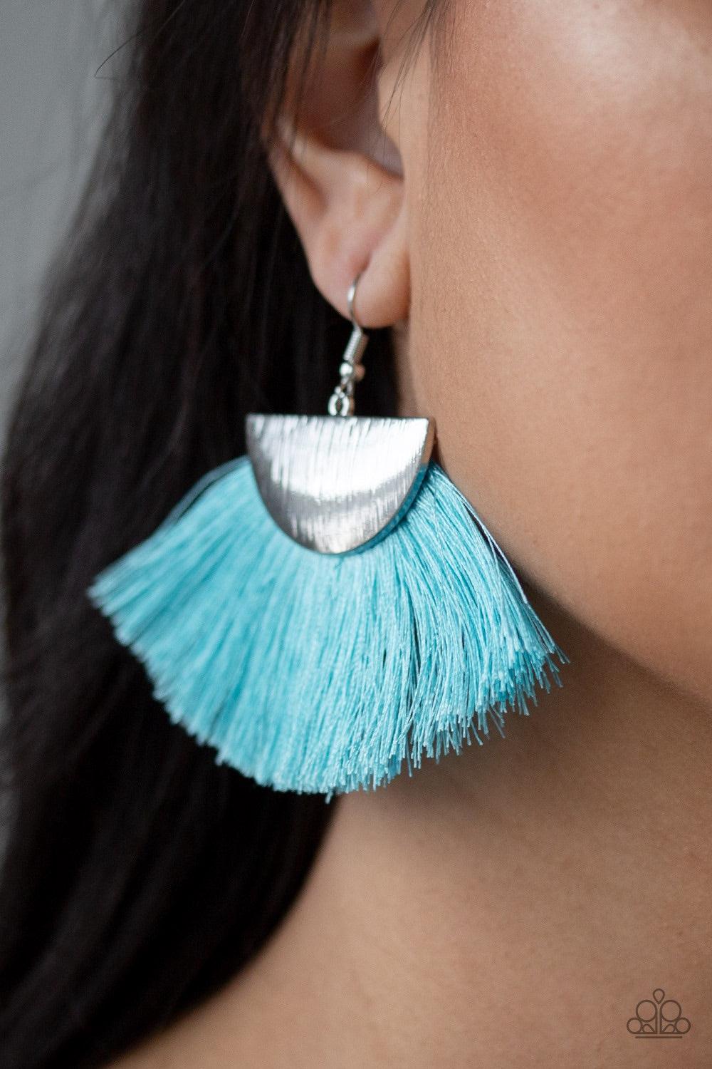 Paparazzi Accessories Fox Trap - Blue A fan of shiny blue thread flares out from the bottom of a shimmery silver crescent frame, creating a foxy fringe. Earring attaches to a standard fishhook fitting. Jewelry