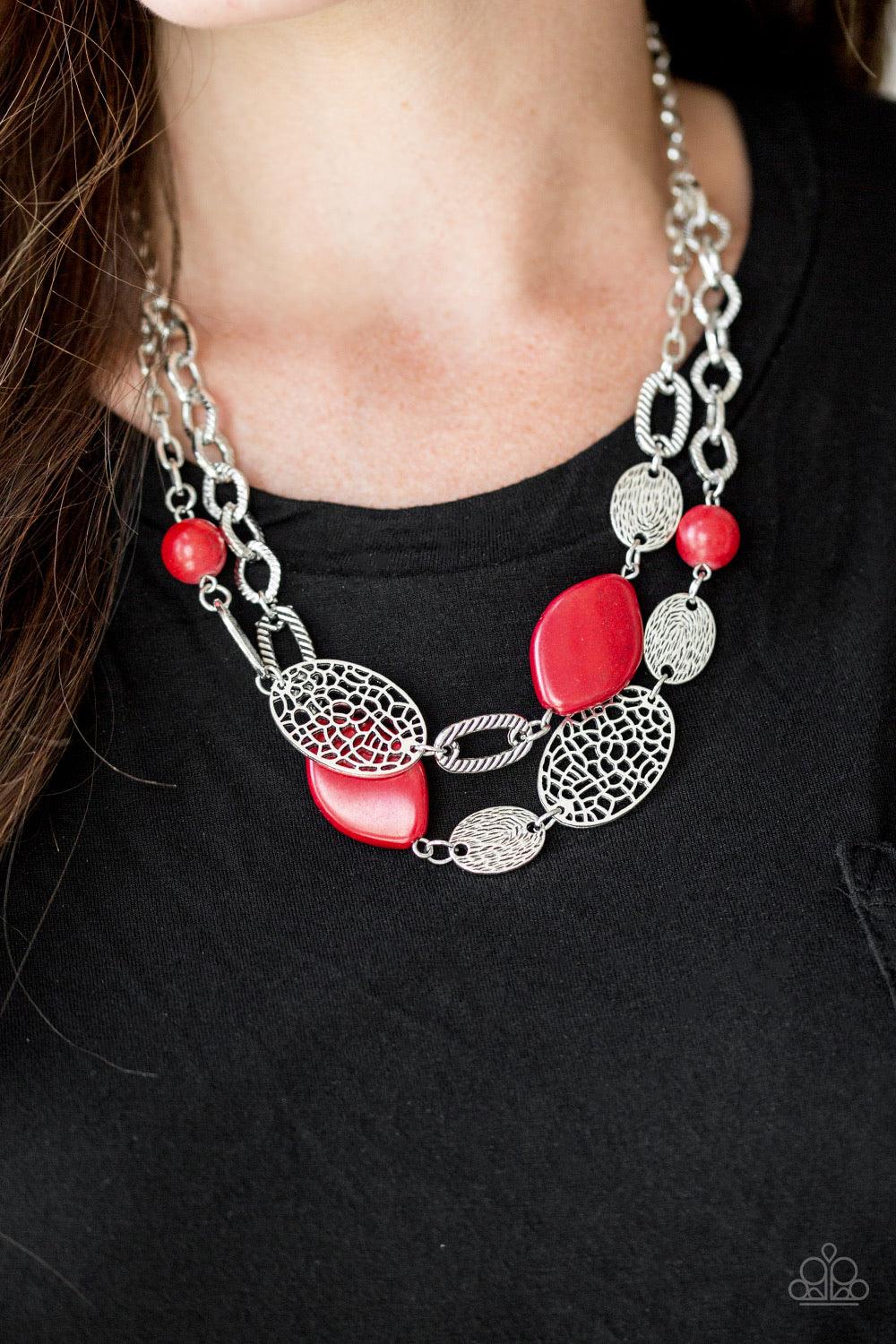 Paparazzi Accessories Second Nature - Red Etched in shimmery textures, a chunky silver chain gives way to a collection of fiery red stones and hammered silver accents. Each featuring patterns derived from nature, the glistening discs join into a layered a