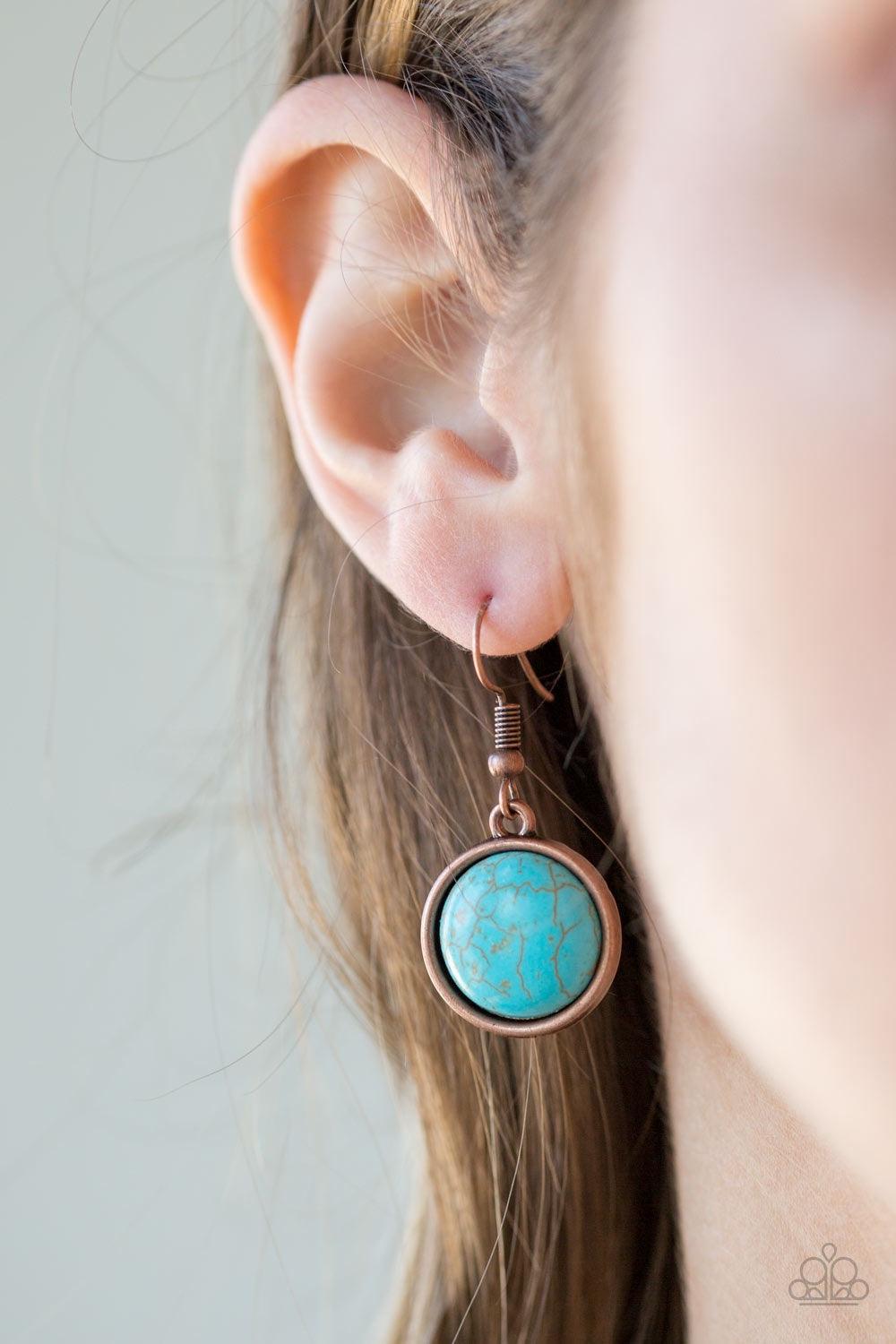 Paparazzi Accessories Cougar - Copper Rippling with hammered details, flared copper frames join below the collar, creating a fierce fringe. Refreshing turquoise stones are pressed into the tops of the frames for a colorful finish. Features an adjustable c