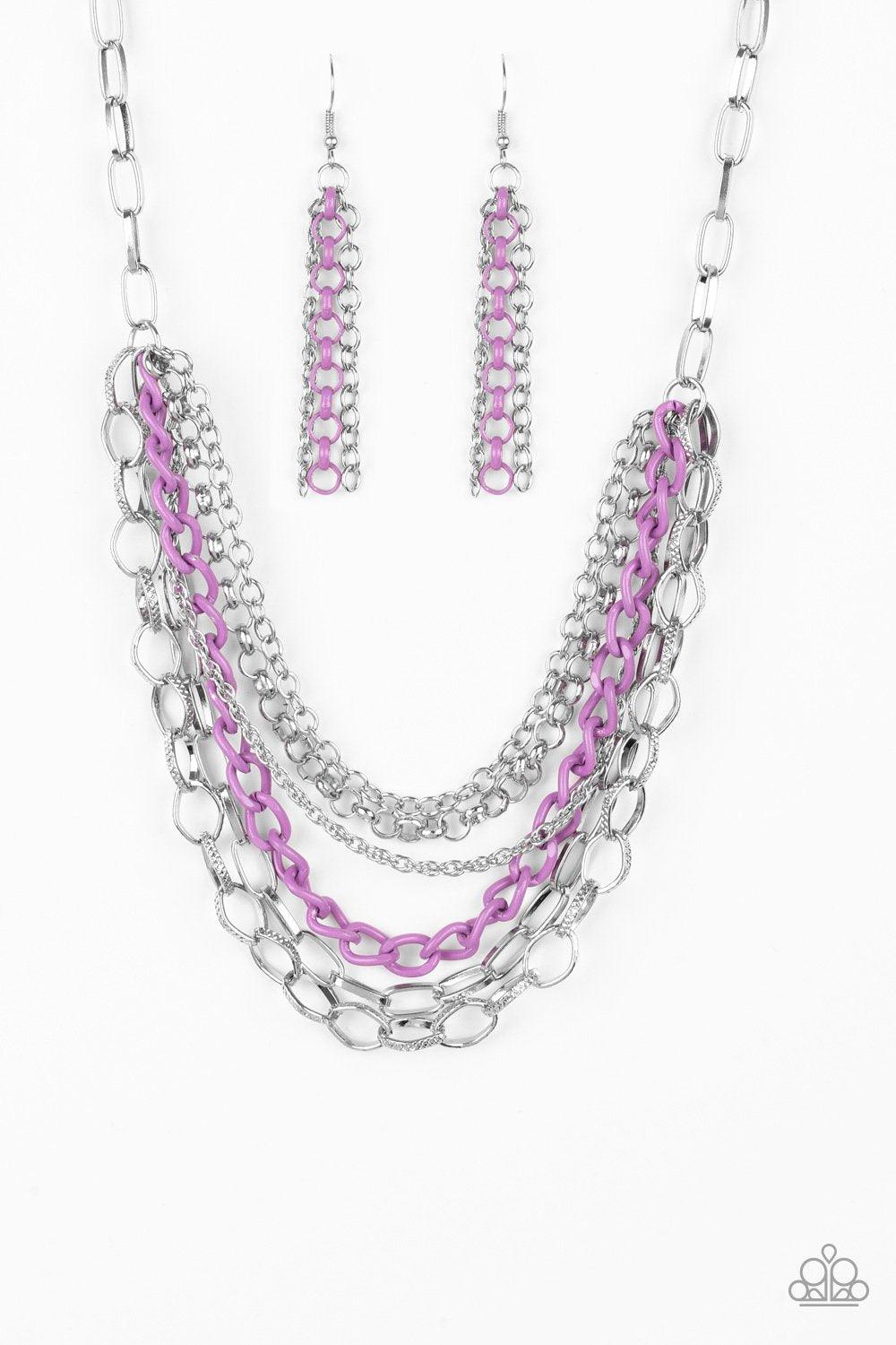 Paparazzi Accessories Color Bomb - Purple Mismatched silver chains layer below the collar for a bold industrial look. Painted in a colorful finish, a shiny purple chain drapes between the shimmery silver chains for a vivacious finish. Features an adjustab