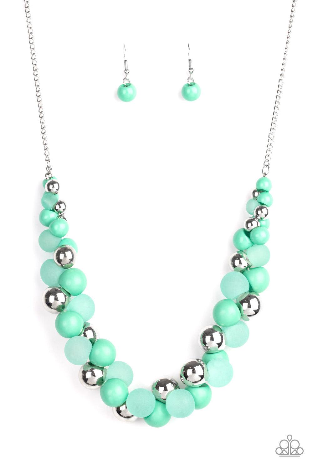 Paparazzi Accessories Bubbly Brilliance - Green A bubbly collection of imperfect silver, opaque, and Biscay Green beads are threaded along an invisible wire below the collar, creating a colorful cluster. Features an adjustable clasp closure. Jewelry