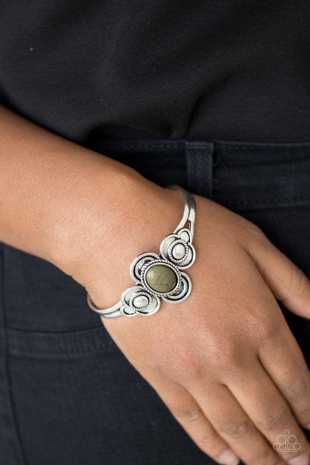 Paparazzi Accessories Dream COWGIRL - Green An earthy green stone is pressed into the center of a dainty silver cuff radiating with textured silver frames for a seasonal look. Sold as one individual bracelet. Jewelry
