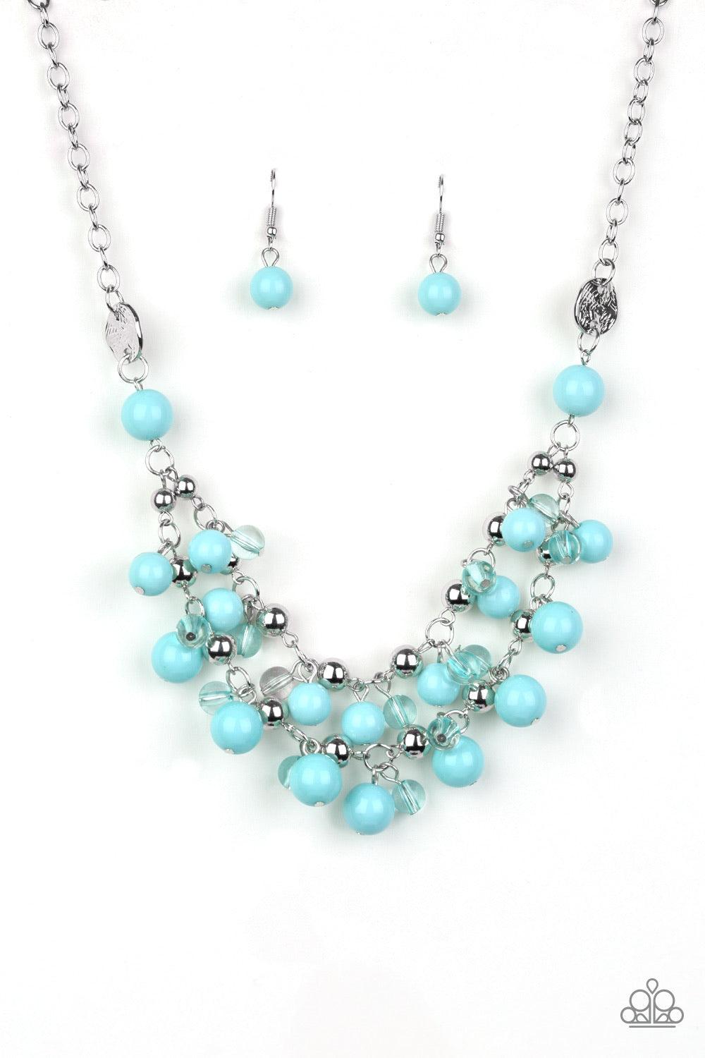 Paparazzi Accessories Seaside Soirée - Blue Hammered silver discs give way to layers of polished blue, glassy, and shiny silver beads. The colorful collection layers below the collar, creating a bubbly fringe. Features an adjustable clasp closure. Sold as