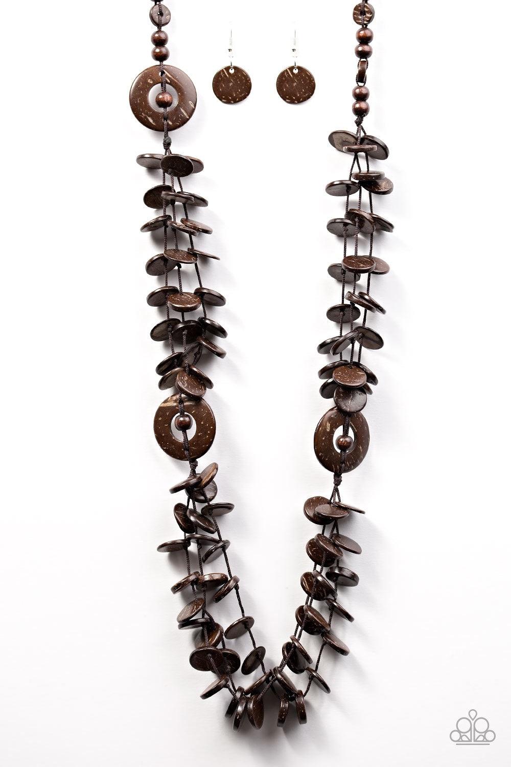 Paparazzi Accessories Greetings From Tahiti - Brown Brushed in a brown finish, wood discs are knotted in strands of brown cording for a tropical look. Polished wooden accents are added to the whimsical palette, adding an earthy flair to the seasonal piece