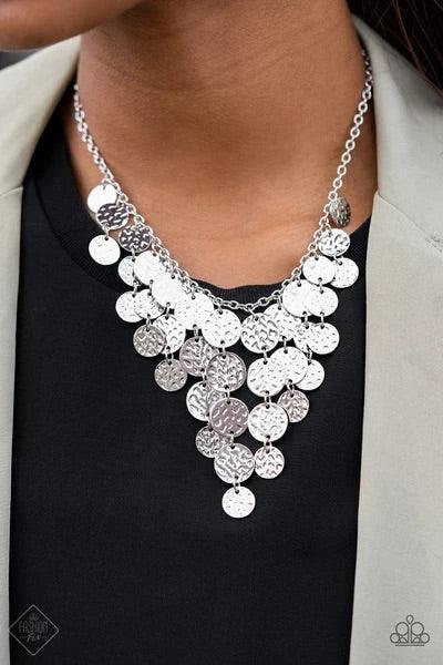 Paparazzi Accessories Spotlight Ready - Silver Rows of hammered silver discs trickle from the bottom of a dainty silver chain, creating an edgy tapered fringe that sways below the collar. Features an adjustable clasp closure. Sold as one individual neckla
