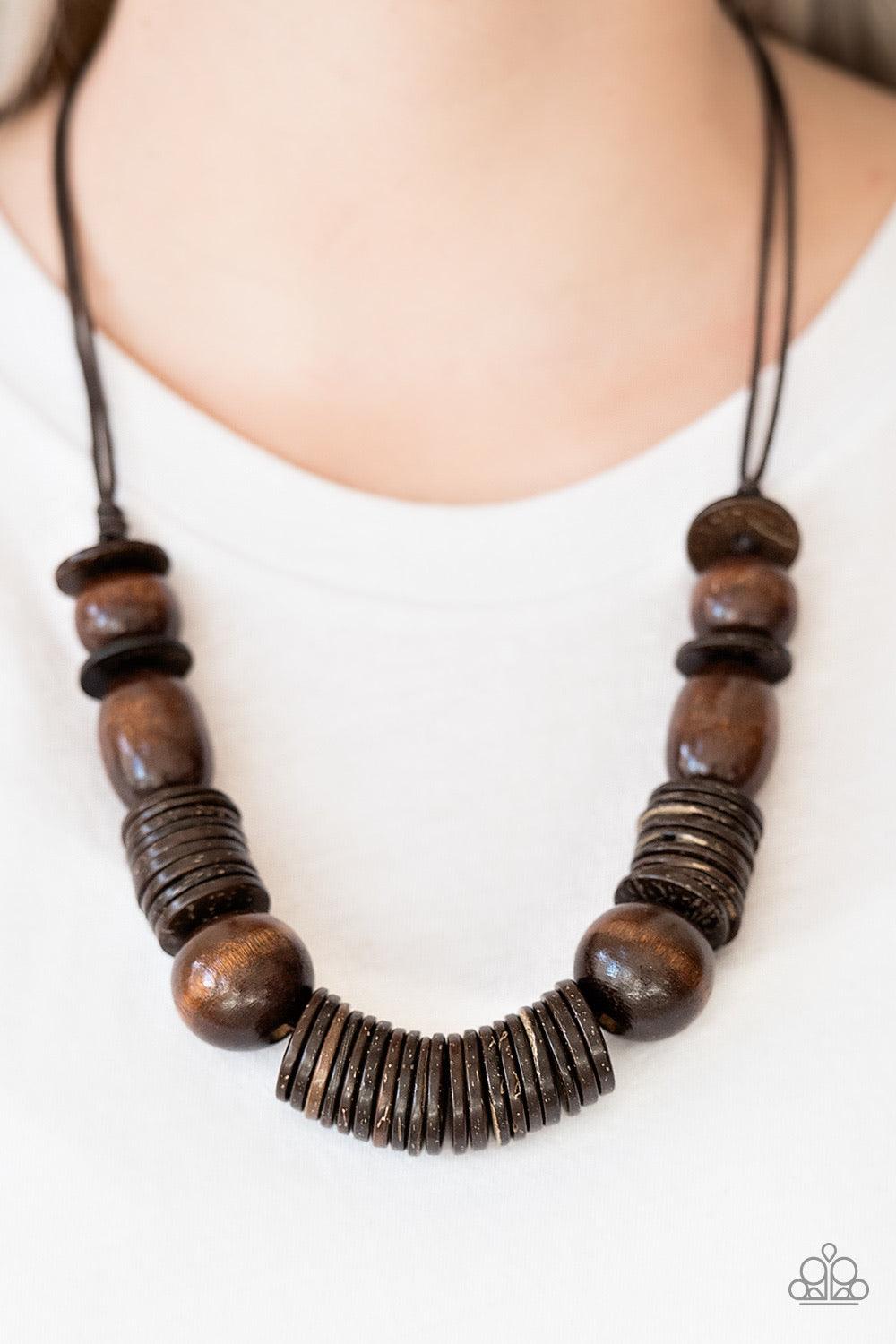 Paparazzi Accessories You Better Belize is - Brown Brushed in a neutral finish, brown wooden beads and brown wooden discs are threaded along shiny brown cording for a summery look. Features an adjustable sliding knot closure. Necklaces
