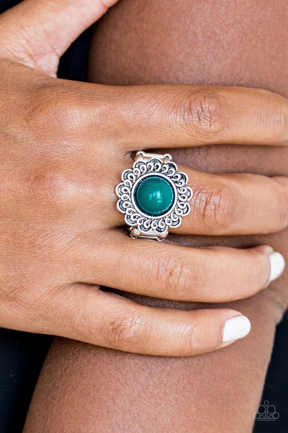 Paparazzi Accessories Garden Stroll - Green A refreshing green bead is pressed into the center of a shimmery floral frame radiating with swirling detail. Features a stretchy band for a flexible fit. Sold as one individual ring. Jewelry