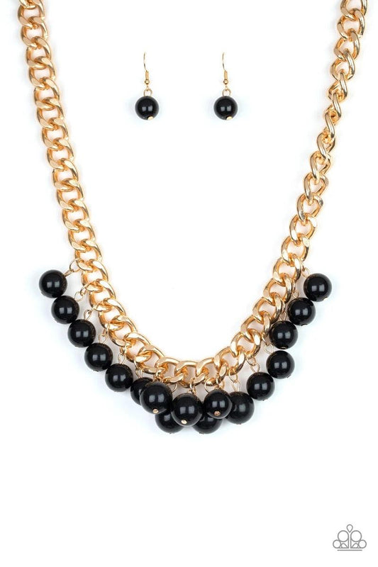 Paparazzi Accessories Get Off My Runway - Gold Bubbly black beads swing from the bottom of a hefty gold chain, creating a dramatic fringe below the collar. Features an adjustable clasp closure. Sold as one individual necklace. Includes one pair of matchin